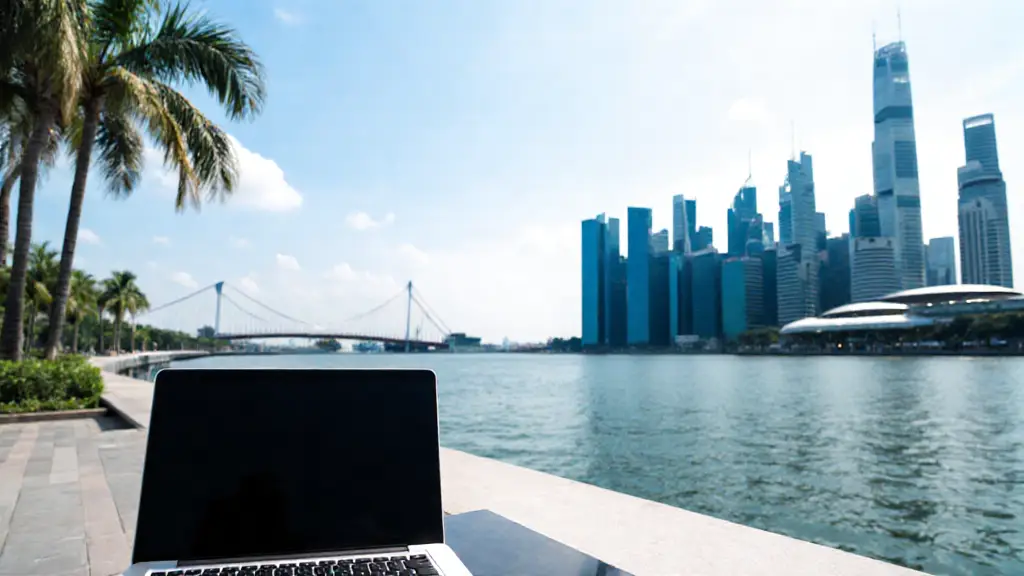 Remote tech worker in Singapore with city skyline