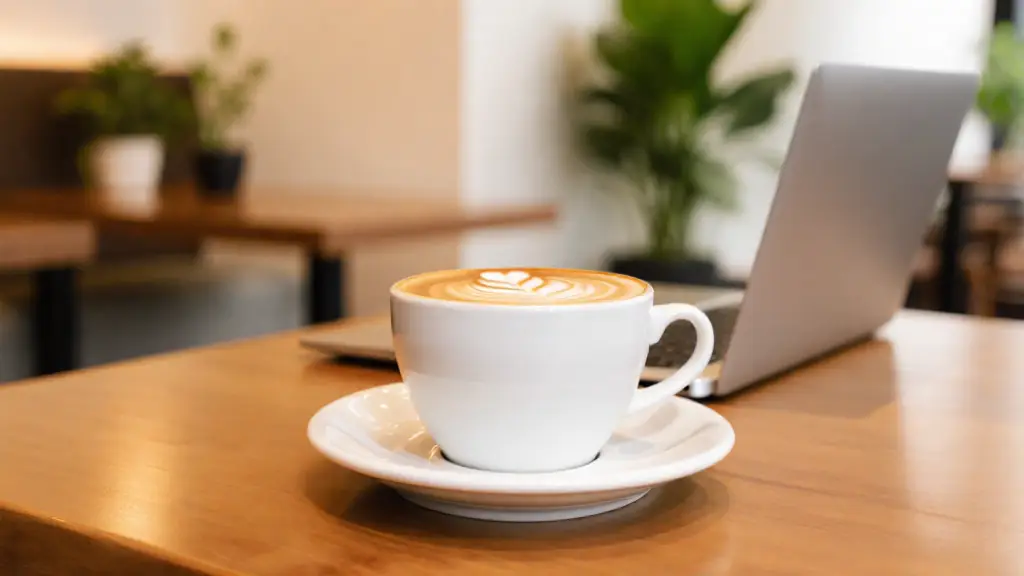 Singapore cafe interior with laptop for remote work